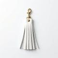 White Italian pebble leather tassel keychain keyring with brass hardware